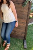 Such a cute top! It's a bit tight up top if you're a little bustier. If you're not I'd say it's true to size. I got a medium. - Alicia J.