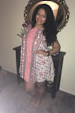 The dress is perfect for a vacation or light summer/spring dress! Super cute and fits very well especially if you're curvy. It runs a little large. I initially got a large, but I had to exchange for a medium. I would def recommend! - Mariel C.