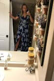It ended up being perfect for me besides being a little long. With heels it will still slightly drag a little. You can tighten the dress enough to not show cleavage or loosen it so you can show cleavage. Overall a nice fit. - Katelin G.