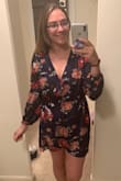 This dress is super cute and fits great. It is a little short in the front due to the cut. The picture is a pink/red color combination on the flowers, but the dress received is more of a dark orange/red color scheme. I kept the dress but really wish it was the pink/red colors. The dress is not as springy as a hope. - Amy B.