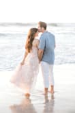 I got so many compliments on this dress in our engagement photos!!! I first got it in a small and although it fit... it was a bit snug so I opted for the medium and got it slightly taken in and had to have it hemmed as well. Super long in length. The color and print and flowyness of this dress really made for the most dreamy photographs! Highly recommend. - Cara H.
