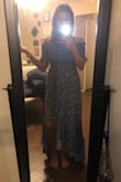 It fits very true to size and the slit is everything! Adding a little something to the dress so you can dress it up or down. - Eneyda G.