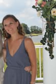 Absolutely love this dress. Perfect fit. Only down side is the grey color shows sweat terribly. Wore it for a beach wedding and of course it was the hottest day ever! - Nicole Z.