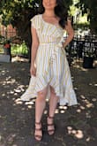 I have never worn a dress with this style before and I loved it. This style is unique and so cute. Amazing quality. I got it dirty while wearing it and spot cleaned some areas with stain remover and put it in the washer and the dress looks brand new. - Brenda I.