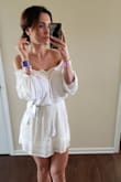 I really love this dress. It is very comfortable. Some reviews say it is sheer at the top, but for me it's ok, just needs strapless beige bra. Perfect for the summer. - Daria F.