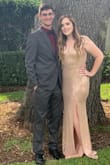 This dress is gorgeous and fit well. I originally ordered a large, which is usually the size I wear and had to send it back and reorder a medium. So I definitely recommend ordering a size down from what you typically wear. - Trinity D.