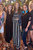 Love this jumpsuit!! It is a dark navy stripe, almost looks black. The pants are high-waisted and very long. Fun to wear for a night out with the girls or on a beach vacay! - Catherine R.