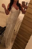 I wore this for my beach wedding in Mexico and it was exactly what I hoped for. The train is absolutely adorable, it hugged all the right places and had a very romantic vibe being all lace. Could not be happier with my choice for a wedding dress. Lulus you're the best! - Brittany L.