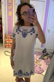 I have loved everything I bought at Lulus so I knew I wasn't going to be disappointed with this purchase. I first bought an XS and it fit perfectly, however I had to return it because it was WAY too short. I bought a small instead and it fits just about the same... it's slightly looser, but the perfect length. I'm pretty small and skinny, so if you're under 5 feet I would recommend getting the XS! The fit is perfect and although it did come wrinkly in the packaging, with a good ironing I know I will love wearing it to my hs graduation :) (excuse my messy room haha also I'm wearing the XS in the pic, like I said the small fits the same, just a little looser and longer...perfect for me!) - Alexis Z.