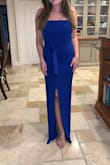 Not sure why all the reviews where saying it ran small, it definitely fits me true to size! Would not change it in any way. Also, the ties around the waist are long enough to tie in the front, which I think looks even better than in a bow in the back! Very pretty, can dress up or down. - Kennedy N.