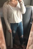 Very cute top wore with skinnies and a duster. It fits a little on the bigger side but I love it. - Shelby