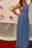 Fits perfectly! Very flattering and flowy! A little long but 3 in heels made it the perfect length. - Lizette P.