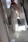 This dress is gorg! I will be getting married on the beach in Mexico and am so excited to show this dress off! Fits perfect.
I was indecisive between small and medium but went with the medium, and I'm glad I did. - Jessie L.