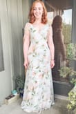 I bought this to wear to my "midsummer night's dream" themed bachelorette party. It is so dreamy and, not surprisingly, the quality from Lulus is amazing. I purchased the small and felt it was probably true to size, although I have a really flat chest and will have to wear some stickies to help "fill out" the bust. The ties at the shoulder are so cute and do help make the bust fit a little better. It's definitely fitted at the waist and hips as other reviewers said, but it gives a polished but flowy look. Perfect length with heels! So gorgeous. I can't recommend it enough! - Julia S.