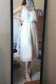 This skirt fits very large. You should order a size smaller so that it fits nicely at the waist. - Madison E.