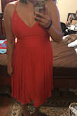 I originally ordered a large but it was ridiculously small and had to order up. It's not bad for my mom bod. I probably just have to lose weight, but for me it was very snug on the waist and when I did order up to an XL, the top portion was a little too big so I had to tie the strings really tight to make it look ok....this dress is better for super skinny girls. - Nicole A.