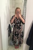After reading the reviews I decided to order a Small instead of my usual Medium and I'm glad I did. This dress is cute and flattering, though might be a little long if you're on the shorter side. Really happy with it! - Marta G.