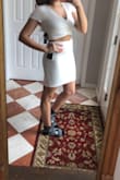Very flattering, fits true to size, shipping was great, even though the dress is white it is not see through, can't wait to wear the stunning dress for my High school graduation! - Maliyah G.