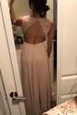 I like it more when the bottom layer and the outer layer match. But this dress, on the slit, the under layer shows more... and the slit is kinda high so if you lift up your dress while you are walking, be careful because your underpants might show lol. - Candy T.