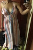 This dress is gorgeous. I have been eyeing this dress for a long time. Love the material. Very airy and light. Looked just like the picture. Get it, you won't regret. I can't wait to wear it. - Michelle A.