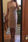 Great dress! I'm usually between a small and medium, medium fit great in this. - Courtney M.