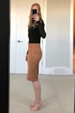 I read the reviews about how tight this skirt is and ordered a size up. The waist is a little loose but it fits well everywhere else. I love that it looks like a heavier suede skirt but has a lightweight feel. Not sure about the durability of this piece but for $20 you cannot go wrong! - Anna A.