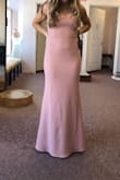 It was a little long on me but only because I'm typically very short and straps were a little big but I have very small shoulders as well. alterations were made and it looks stunning! Such a lovey color! (I ordered the pink) the photo is after alterations (shortened length and tightened straps). - Jessica M.