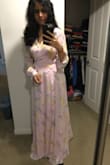 Love the color, material, fit and look of the dress. Fits true to size and perfect for a photo shoot. Pair with some high heels and looks extremely elegant. Beautiful pink color. - Sarita U.