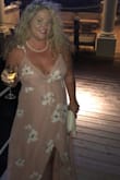 Beautiful high low dress. Wrap aspect makes it easy to adjust the sizing. - Stacy P.