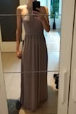 The dress is relatively nice but the material is too heavy. It could also be shorter. - Tamara L.
