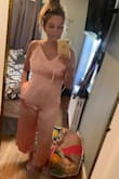 This comfy, soft and stylish jumper is sleek sexy and did I mention comfortable ?! Pictured again with no bra or heels... can't wait to wear this for summer day or night time events ! It's beautiful quality - not sheer / see through at all. It fits in all the right places, chest waist & booty. Lightweight while wearing it. The color is a perfect soft pink, just as pictured. Thank you Lulus you did it again! One happy customer! P.s. it has POCKETS! - Sarah S.