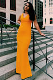 I was initially worried about the brightness of the orange, but it really made me pop at Prom especially for such a reasonable price! The straps were a little long, but I had my mom stitch them shorter and it ended up fitting like a glove! The dress is lined and so it is extra comfortable to dance in. I would definitely recommend it! - Meera N.