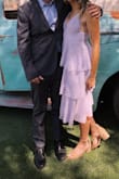I had ordered this dress in the light blue color in an XS that unfortunately was too small (not sure why I even chose XS over S in the first place). I was so sad to return because it was the perfect dress for my brother's wedding and the only one I envisioned wearing. But when I saw my size in the lavender color, it was even better! I received so many compliments and it was a flattering dress, as well as appropriate to wear around family. Only bummer and reason I am giving 4 stars instead of 5 is because about 30 minutes into wearing it, one of the straps snapped (right before the ceremony began too!). A quick safety pin for the night and stitch up in the morning worked okay. I will definitely keep for quite a while! - Lanie W.