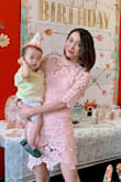 It's bit short! Shorter than I expected. I love the details. I picked this for Easter / my son's first birthday. Everyone seems to like it! - Tongtong Z.