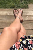 I bought these in gold. The straps are a little loose, but they were not unbearable. I have very narrow feet. I did not have any problems with my feet slipping out of them. I wore these on Easter with a dress I also bought from Lulus. :) - Jaqlynn B.