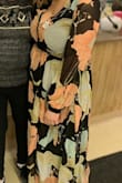The only issue I had was it was too low cut for my bust size so I had to have it pinned together. - Nicole C.