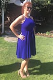 I had to return a dress that was too big...I purchased this dress for an outdoor April Wedding! The fit was very relaxed and felt very comfortable! It was very flattering and I got many compliments! I danced the night away as the bottom flowed around nicely! An extra bonus was even with a very sweaty dance off there were NO sweat marks! LOvED THIS DRESS!!! - Angelia C.