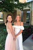 I wore this dress for my sorority formal and was in absolute awe of how beautiful it is. The back was to die for - I wish I had gotten a picture that showed off a little more as that was definitely my favorite part. The dress is so flattering and I received compliments the whole night. So grateful I ordered this dress before it sold out! - Kayla L.