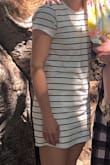 I love this dress! It's got a lining, so it's not see through. The size is a little big, but it's meant to be so I sized down and it's perfect! - Amy K.