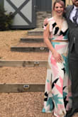 I wore this dress to a wedding and got tons of compliments. Perfect for spring and I can't wait to wear it again. I could probably ordered a small for a tighter top and the skirt was very forgiving since it has a elastic in the back. Overall I was very comfortable! - Chelsa O.