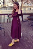 The dress is a little long (almost maxi) if you are short. Loose but in a good way for me. I really like the follower detail: - Ann K.