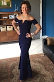 This dress fit like a glove although I did need to have it hemmed. I am 5'3" and wore 3" heels. Ordered size S. Very comfortable and thick fabric that is pretty forgiving. Hoping to wear again soon! - Sarah T.
