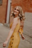 Wore for my senior pictures and looked super classy. If you're short it's good since it's cropped. - Shelby B.