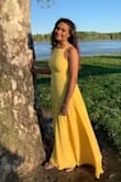My daughter wore this dress to her senior prom and she was so bright and stunning in it! It fit great! We did have a friend hem the front because she's not super tall and we had her leave the back a bit long to give it a slight train on the back. Would totally recommend Lulus and will shop here again! - Home I.