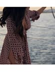 This outfit is absolutely gorgeous. I love the beautiful maxi skirt with a high-rise waist and thigh high slit and invisible back zipper. The fabric is colorful, comfortable, flowy and light. I really recommend purchasing the entire two-piece set. - Mayra G.