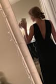 I got this dress for prom and I usually order mediums off of Lulus. If you look at the sizing chart and measure yourself you should be perfect. I got a small and it fit perfectly. The dress slit is positioned well and the chest isn't too low. If you have a smaller chest you won't need to wear a bra. - Bella L.