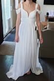 This dress is gorgeous and runs true to size! It's very high quality! - Bailey C.