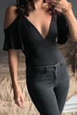 I didn't think anything could beat my other Lulus body suit, but this one is doing the trick! It is super comfortable and I love the cold shoulder + deep v combo. The material reminds me of what swimsuits are made out of, so it doesn't hide very much, but it's really stretchy so your arms are restrained by the hanging sleeves. Love love love - Brandi K.