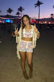 I got both the top and shorts in a large. I wore them to Coachella and got so many compliments! - Deanna P.