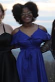When I first came across this dress I instantly fell in love with it! I ended up choosing this as my prom dress and got so many compliments about it. My only complaint is that I wish the button for the for the breast was more secure. As a girl with a decently sized chest I felt like my girlies were gonna pop out but I was able to fix it and would still recommend the dress to anyone. - JammyLee S.